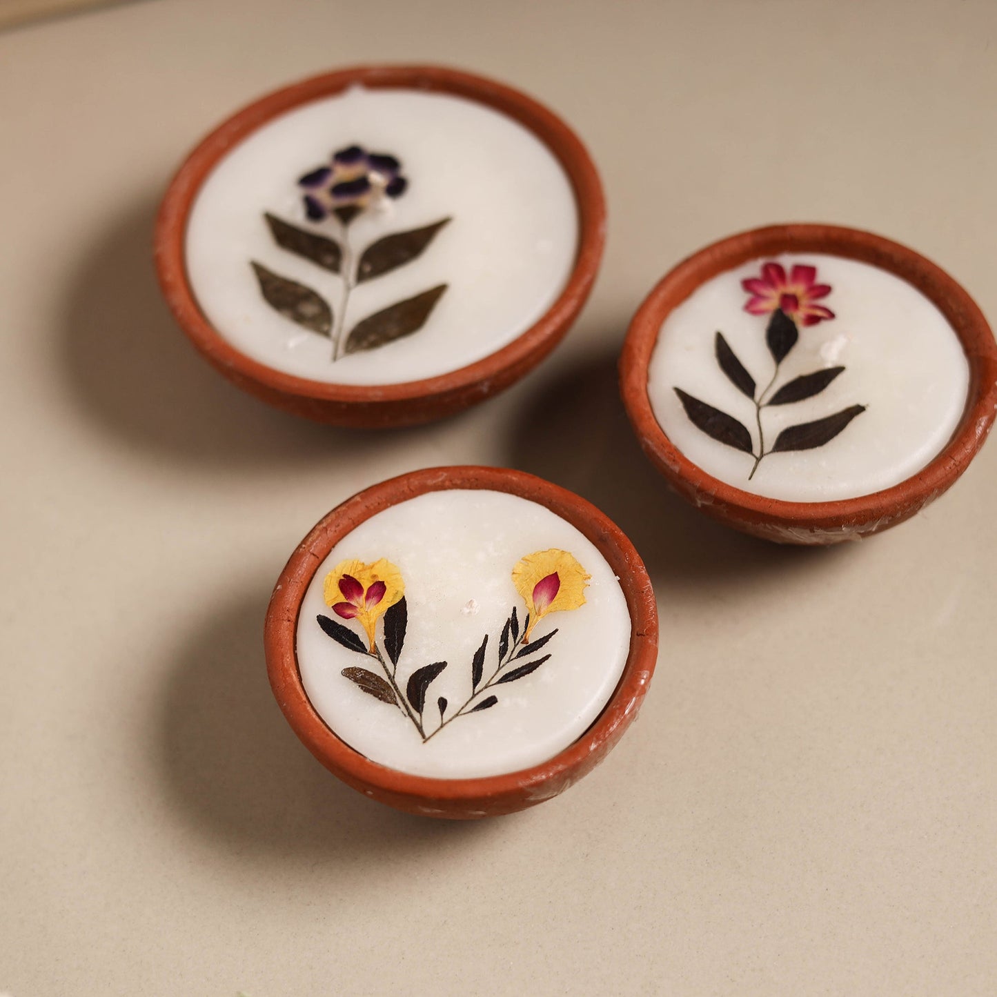 Sri aurobindo ashram clay diya with wax (set of 3) 05