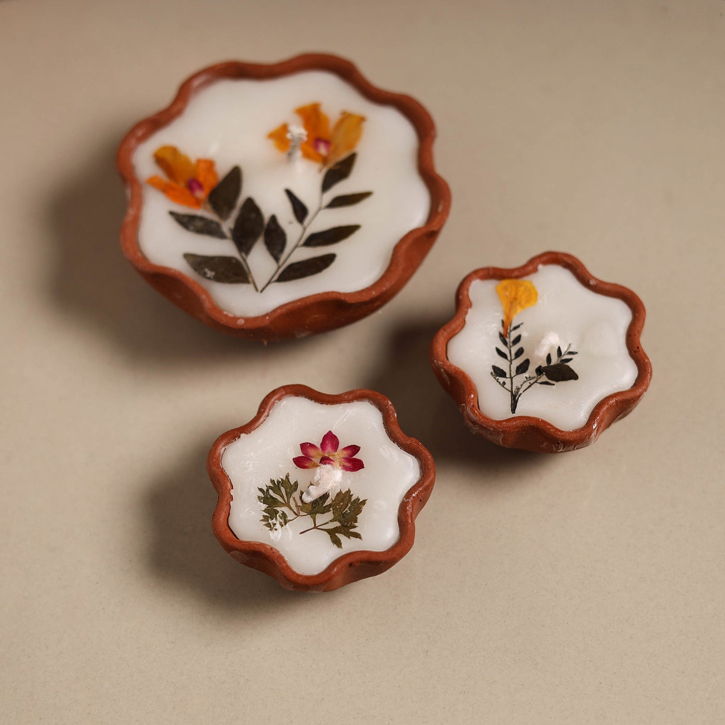 Sri aurobindo ashram clay diya with wax (set of 3) 07