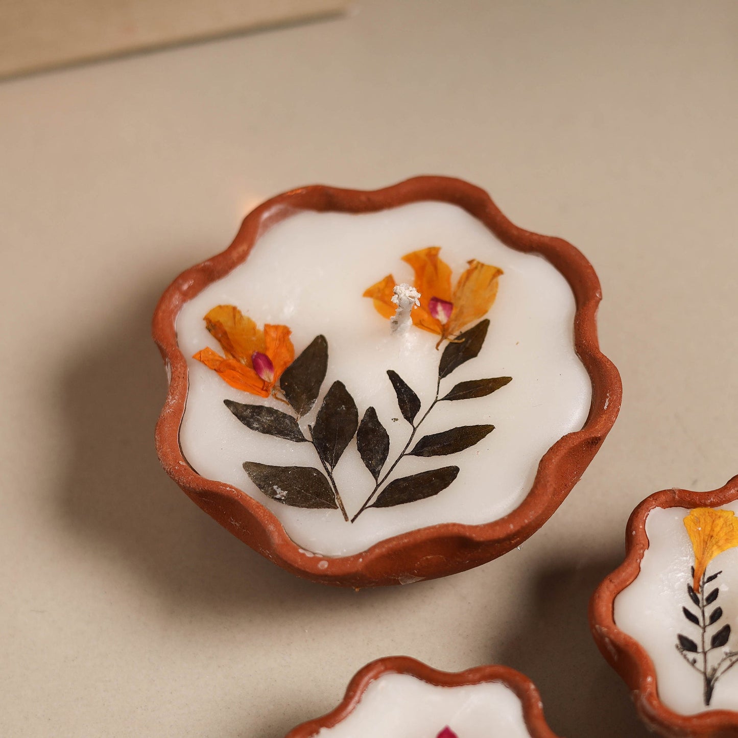 Sri aurobindo ashram clay diya with wax (set of 3) 07