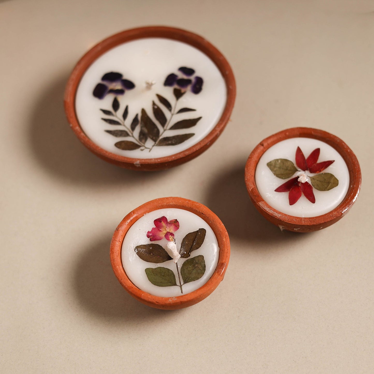 Sri aurobindo ashram clay diya with wax (set of 3) 08