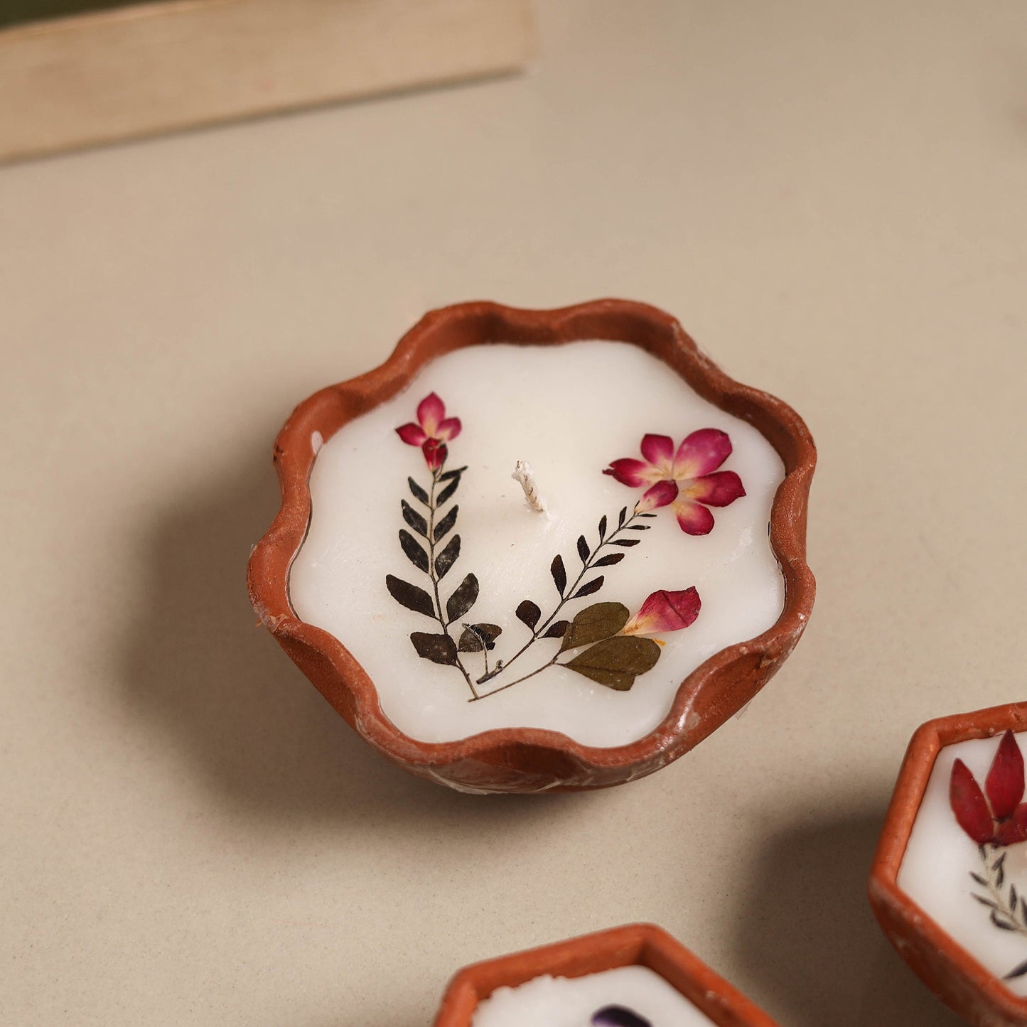 Sri aurobindo ashram clay diya with wax (set of 3) 09