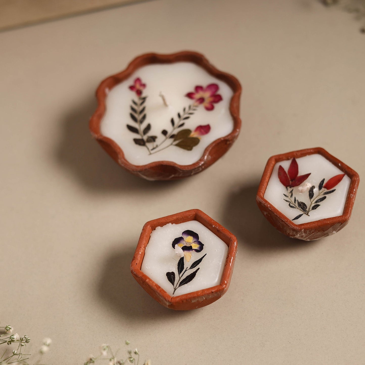 Sri aurobindo ashram clay diya with wax (set of 3) 09