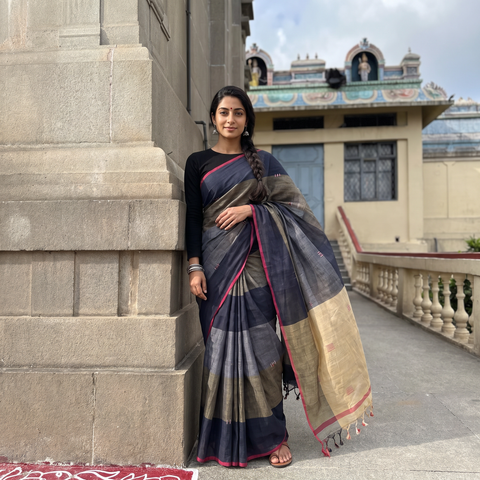 Multicolor Srikakulam Handloom Jamdani Buti Cotton Saree with Tassels, draped and worn by a woman, AI visual of the saree, iTokri