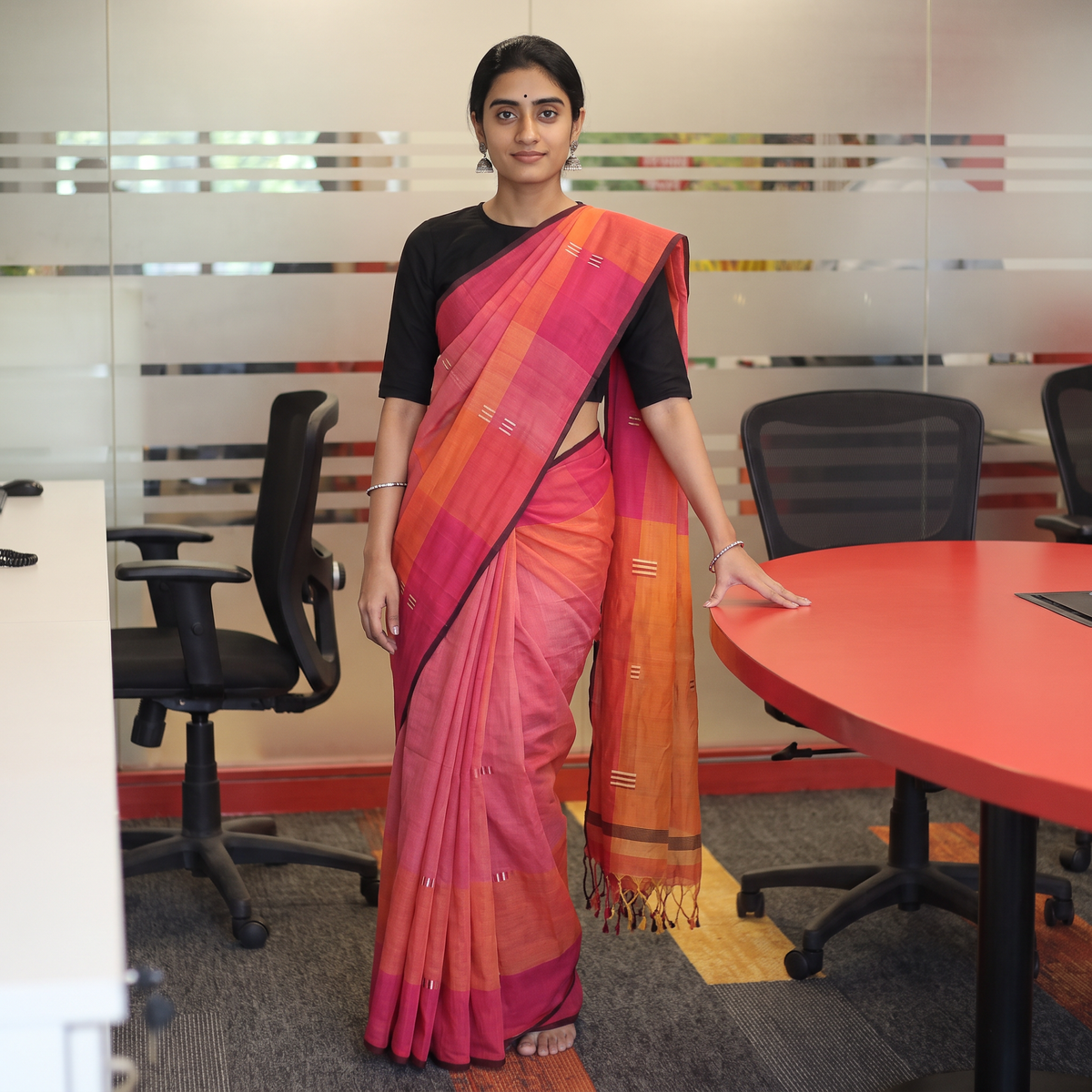 Pink Srikakulam Handloom Jamdani Buti Cotton Saree with Tassels, draped and worn by a woman, AI visual of the saree, iTokri