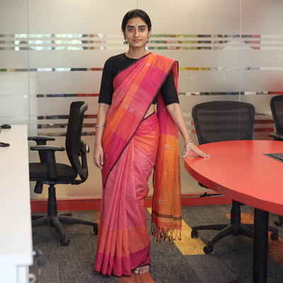 Pink Srikakulam Handloom Jamdani Buti Cotton Saree with Tassels, draped and worn by a woman, AI visual of the saree, iTokri