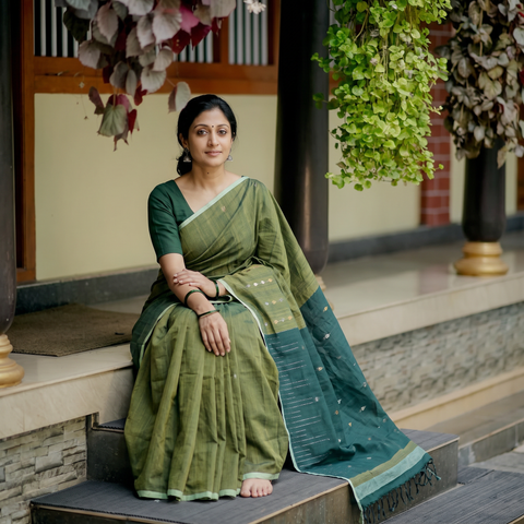 Green Srikakulam Jamdani Buti Pure Handspun Handloom Cotton Saree, draped and worn by a woman, AI visual of the saree, iTokri