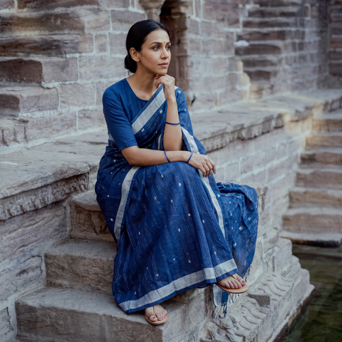 Blue Srikakulam Jamdani Buti Zari Pure Handloom Cotton Saree, draped and worn by a woman, AI visual of the saree, iTokri