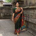 Green Srikalahasti Handloom Mangalagiri Silk Handpainted Pen Kalamkari Saree with Zari Border, draped and worn by a woman, AI visual of the saree, iTokri