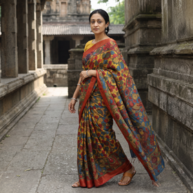 Multicolor Srikalahasti Kalamkari Pen Work Mangalagiri Silk Saree with Zari Border, draped and worn by a woman, AI visual of the saree, iTokri