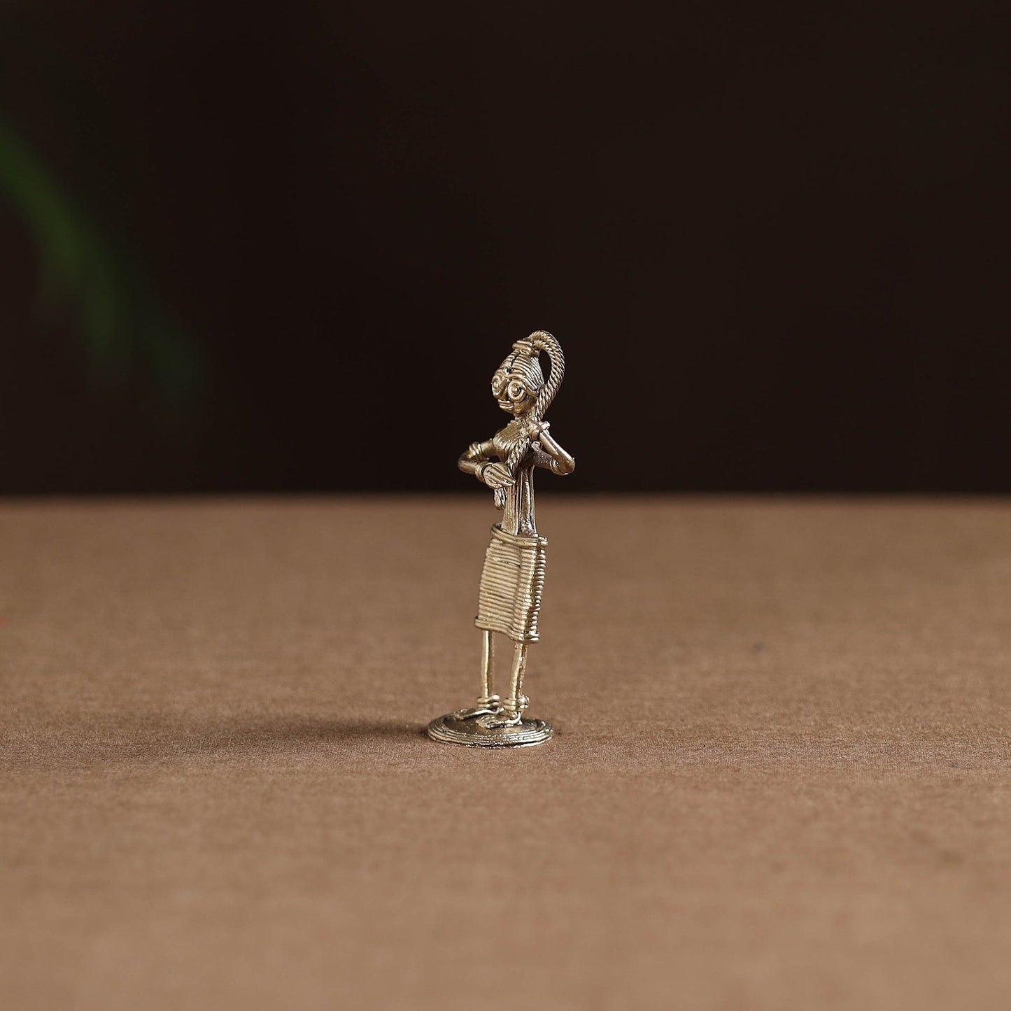 Standing lady with braising her hair tribal odisha dokra