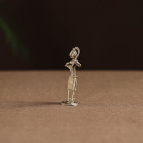 Standing lady with braising her hair tribal odisha dokra