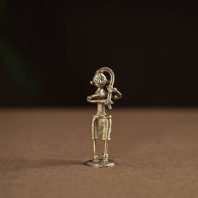 Standing lady with braising her hair tribal odisha dokra