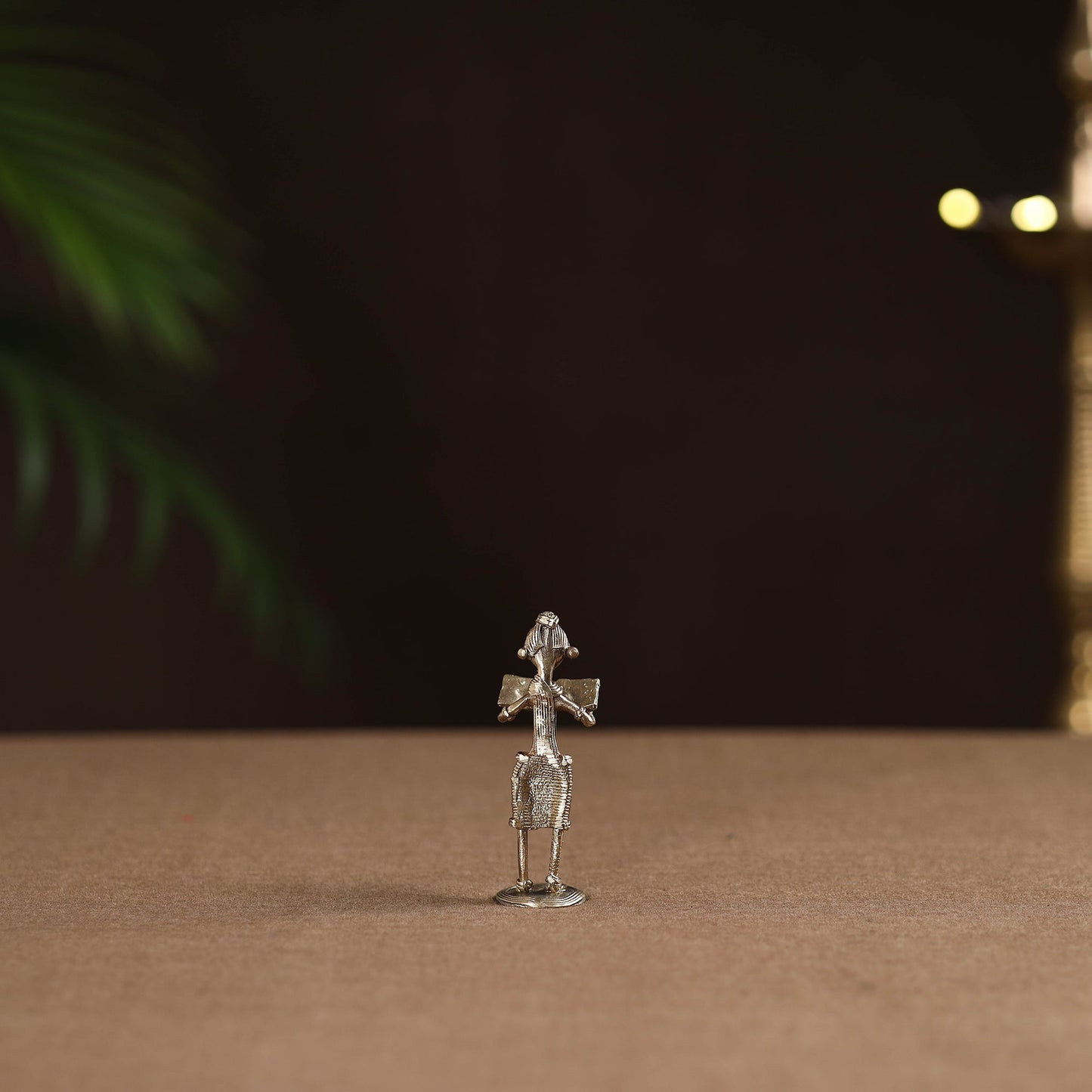 Standing lady with reading book tribal odisha dokra art