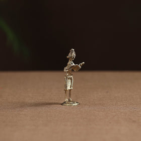 Standing lady with reading book tribal odisha dokra art