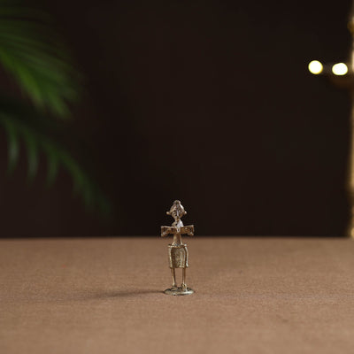 Standing lady with reading book tribal odisha dokra art