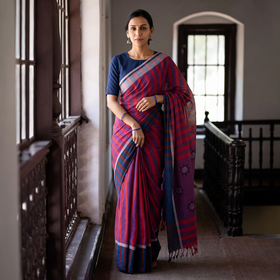 Purple Stripe Cotton Saree with Floral Extra Weft, draped and worn by a woman, AI visual of the saree, iTokri