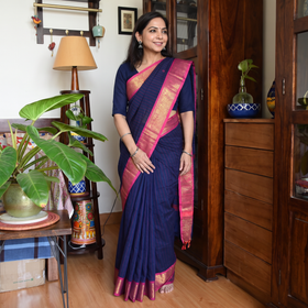 Blue Stripes Buti Cotton Zari Border Kanchipuram Saree, draped and worn by a woman, AI visual of the saree, iTokri
