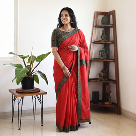 Red Tagai & Mirror Embroidered Ajrakh Patchwork Pure Mul Cotton Saree with Blouse Piece, draped and worn by a woman, AI visual of the saree, iTokri