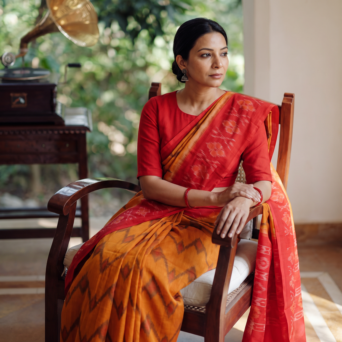 Orange Telia Rumal Handloom Cotton Pochampally Double Ikat Saree, draped and worn by a woman, AI visual of the saree, iTokri