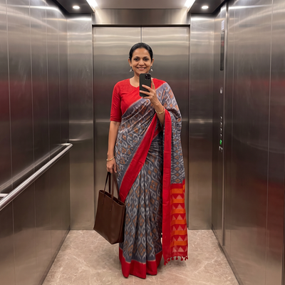 Blue Telia Rumal Handloom Cotton Pochampally Double Ikat Saree, draped and worn by a woman, AI visual of the saree, iTokri