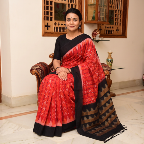 Red Telia Rumal Handloom Cotton Pochampally Double Ikat Saree, draped and worn by a woman, AI visual of the saree, iTokri