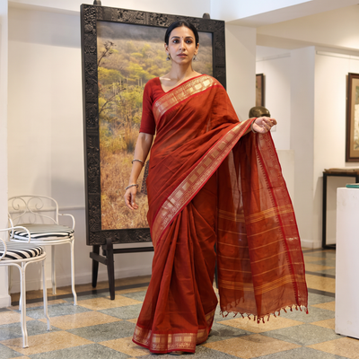 Brown Thread Buti Cotton Kanchipuram Saree with Border, draped and worn by a woman, AI visual of the saree, iTokri