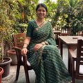 Dark Green Tie-Dye Chanderi Silk Leheriya Saree with Zari Border, draped and worn by a woman, AI visual of the saree, iTokri