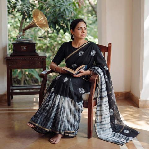 Black Tie & Dye Chanderi Silk Shibori Saree with Zari Border, draped and worn by a woman, AI visual of the saree, iTokri