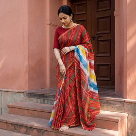 Red Tie-Dye Kota Doria Cotton Leheriya Saree, draped and worn by a woman, AI visual of the saree, iTokri