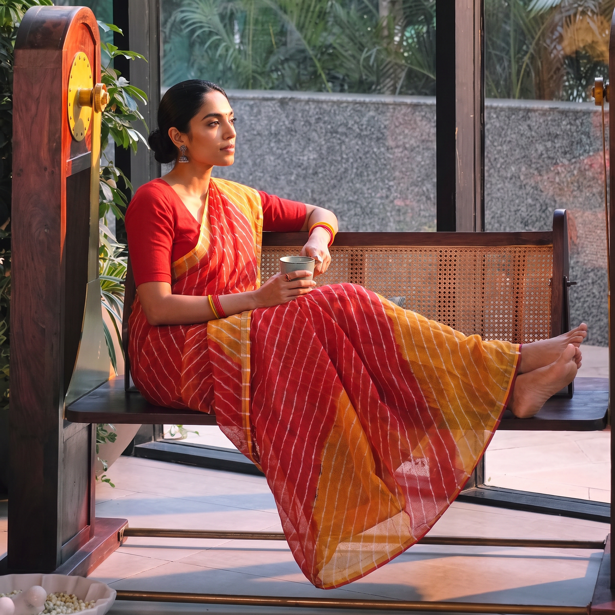 Multicolor Tie-Dye Kota Doria Cotton Leheriya Saree, draped and worn by a woman, AI visual of the saree, iTokri
