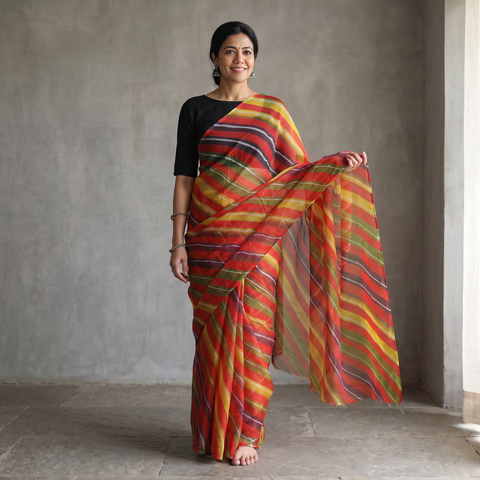 Red Tie-Dye Kota Doria Cotton Leheriya Saree, draped and worn by a woman, AI visual of the saree, iTokri