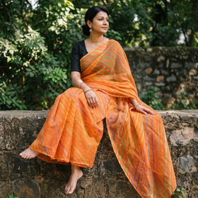 Orange Tie-Dye Kota Doria Cotton Leheriya Saree, draped and worn by a woman, AI visual of the saree, iTokri