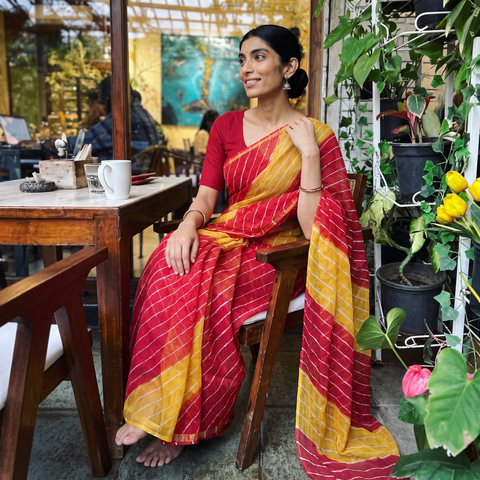Multicolor Tie-Dye Kota Doria Cotton Leheriya Saree, draped and worn by a woman, AI visual of the saree, iTokri