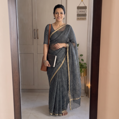 Black Tie-Dye Kota Doria Silk Leheriya Saree, draped and worn by a woman, AI visual of the saree, iTokri