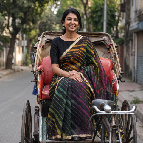 Multicolor Tie-Dye Kota Doria Silk Leheriya Saree, draped and worn by a woman, AI visual of the saree, iTokri