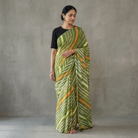 Green Tie-Dye Mulberry Silk Handloom Leheriya Saree, draped and worn by a woman, AI visual of the saree, iTokri