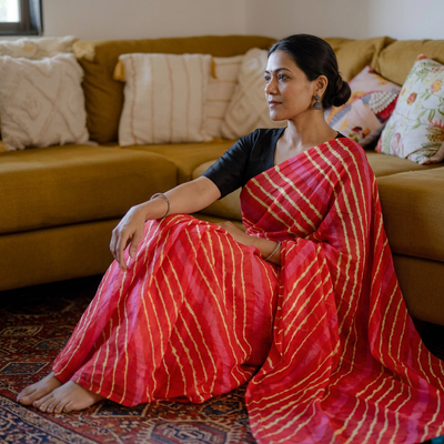 Pink Tie-Dye Mulberry Silk Handloom Leheriya Saree, draped and worn by a woman, AI visual of the saree, iTokri