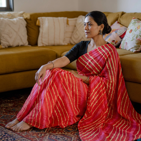 Pink Tie-Dye Mulberry Silk Handloom Leheriya Saree, draped and worn by a woman, AI visual of the saree, iTokri