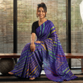 Purple Tie-Dye Tussar Silk Handloom Leheriya Saree, draped and worn by a woman, AI visual of the saree, iTokri