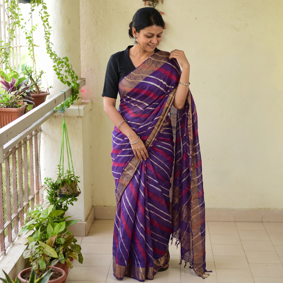 Purple Tie-Dye Tussar Silk Handloom Leheriya Saree, draped and worn by a woman, AI visual of the saree, iTokri