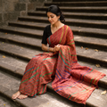 Red Tie-Dye Tussar Silk Handloom Leheriya Saree, draped and worn by a woman, AI visual of the saree, iTokri