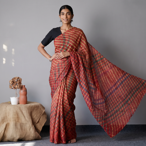 Red Tie-Dye Tussar Silk Handloom Leheriya Saree, draped and worn by a woman, AI visual of the saree, iTokri