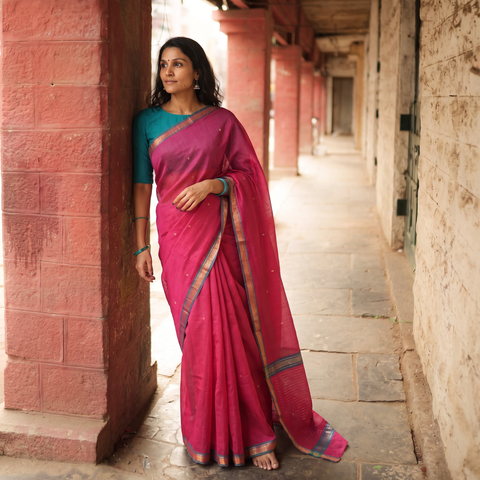 Pink Traditional Buti Handloom Zari Work Saree, draped and worn by a woman, AI visual of the saree, iTokri