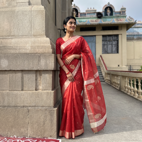 Maroon Traditional Chanderi Silk Buta Handloom Zari Work Saree, draped and worn by a woman, AI visual of the saree, iTokri