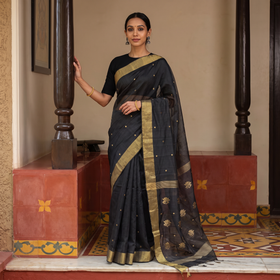 Black Traditional Chanderi Silk Handloom Saree with Zari Border & Buta, draped and worn by a woman, AI visual of the saree, iTokri