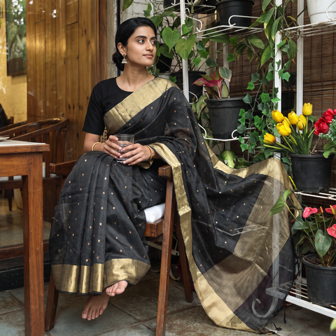 Grey Traditional Chanderi Silk Handloom Saree with Zari Border & Buti, draped and worn by a woman, AI visual of the saree, iTokri