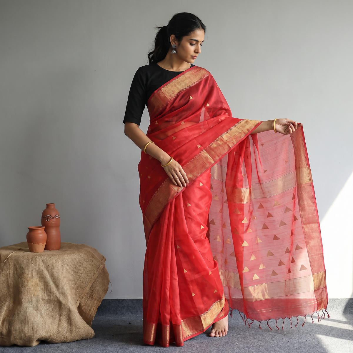 Red Traditional Chanderi Silk Handloom Saree with Zari Border & Buti, draped and worn by a woman, AI visual of the saree, iTokri
