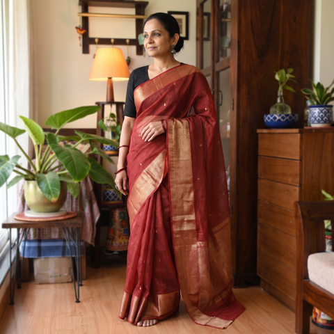 Maroon Traditional Chanderi Silk Handloom Zari Work Saree by Rauph Khan, draped and worn by a woman, AI visual of the saree, iTokri