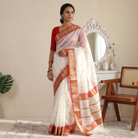 White Traditional Handloom Chanderi Silk Saree, draped and worn by a woman, AI visual of the saree, iTokri