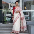 White Traditional Handloom Maheshwari Silk Saree, draped and worn by a woman, AI visual of the saree, iTokri